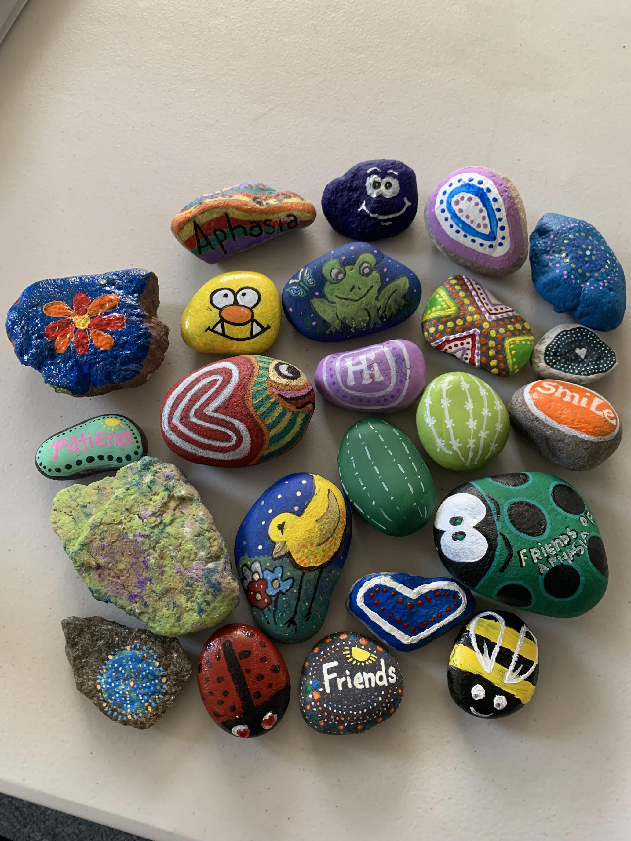 Friends of Aphasia painted rocks 2024