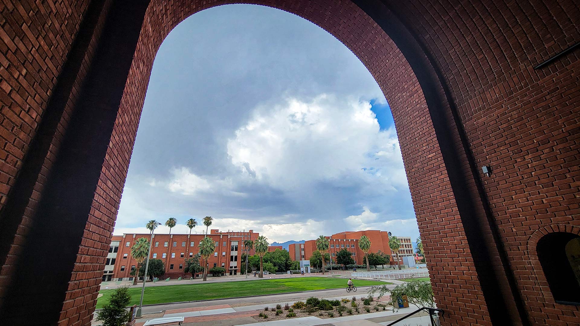 Looking out across the University of Arizona mall towards the Modern Languages and Psychology buildings, from the entrance of the Bear Down Gym.