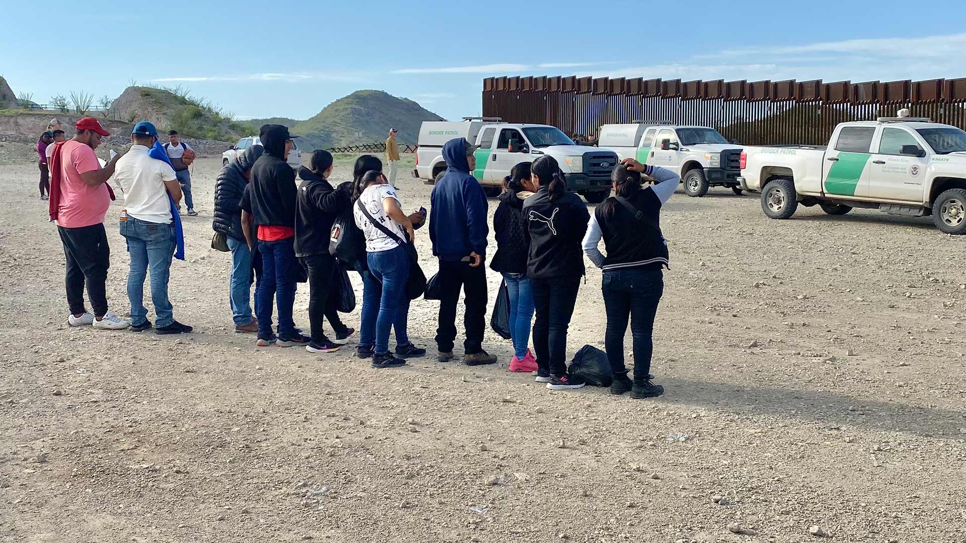 Border Patrol agents apprehend migrants outside of Sasabe, Arizona, in July 2024.