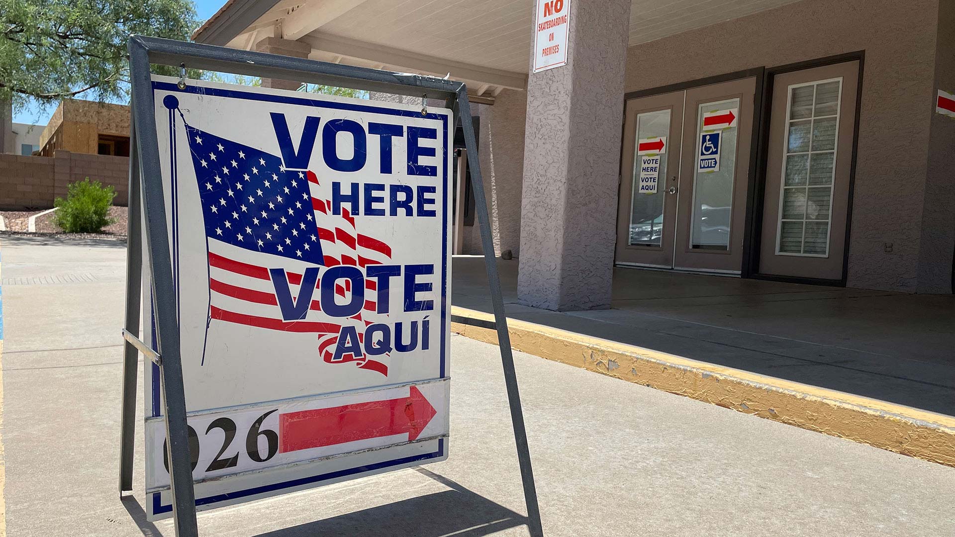 A sign outside a polling center in Tucson, Ariz.