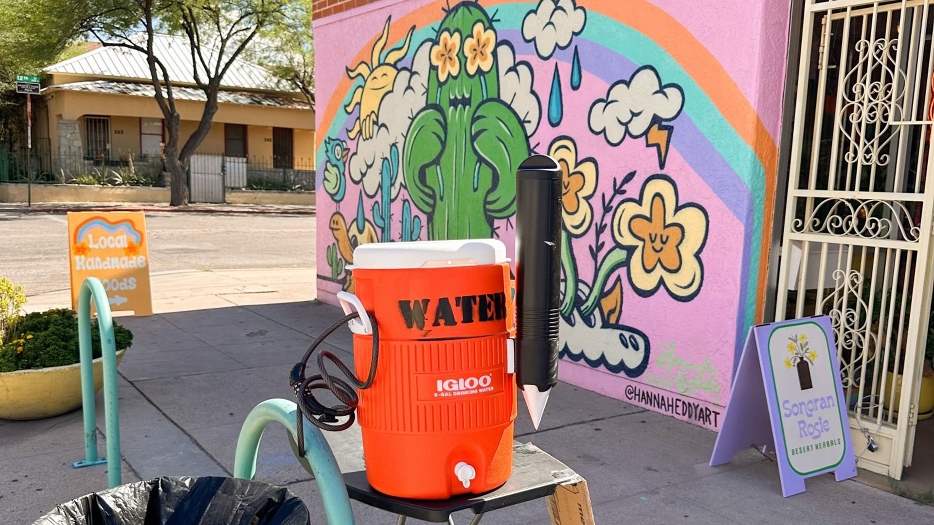 A free water station outside of the Arizona Poppy shop on South Fourth Avenue in Tucson, Ariz.