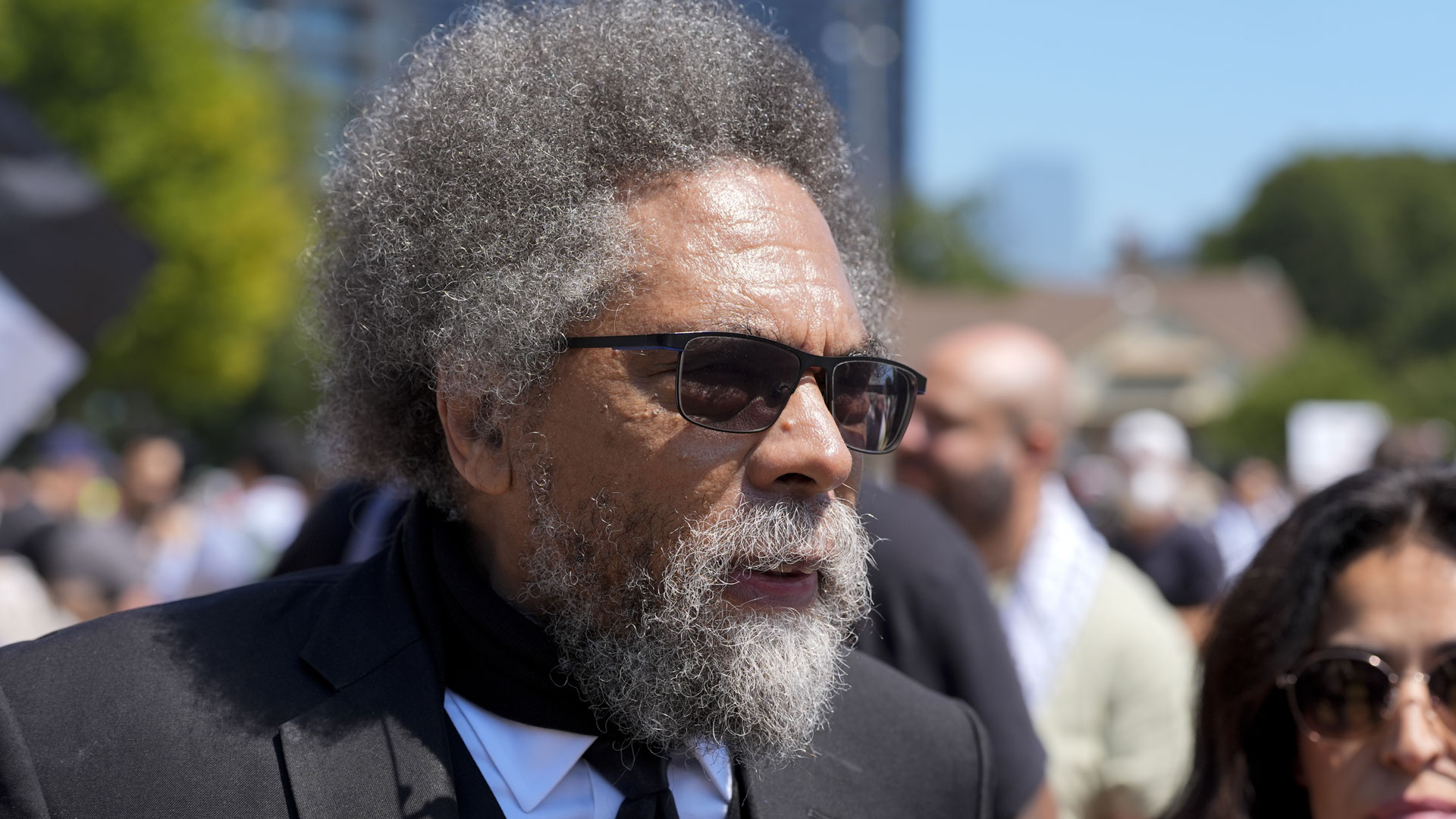 Progressive activist Cornel West watches a demonstration prior to a march to the Democratic National Convention Monday, Aug. 19, 2024, in Chicago.