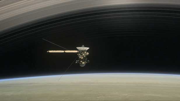 Illustration of the Cassini spacecraft orbiting Saturn.