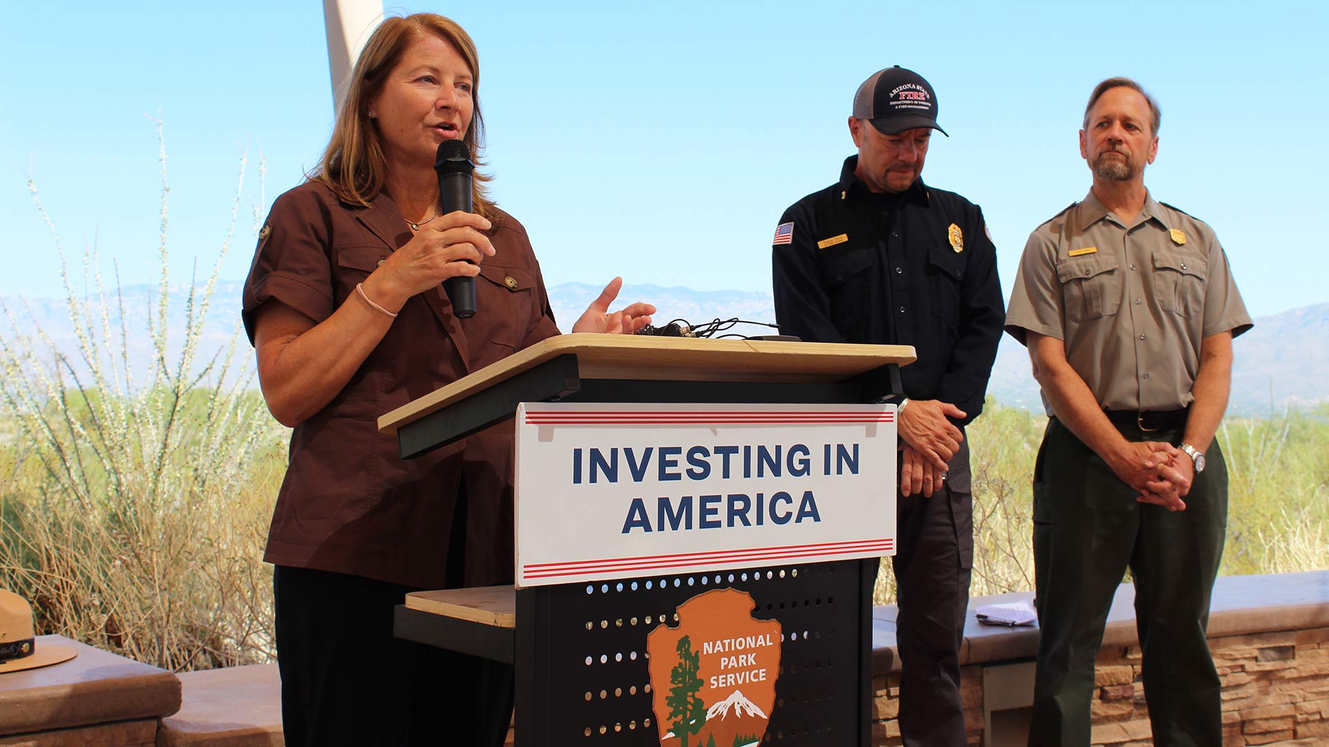 Laura Daniel-Davis, Acting Deputy Secretary for the Department of the Interior announces federal investments to support wildland fire management at Saguaro National Park in Tucson, Ariz., on Tuesday, Sept. 10, 2024. Alongside Daniel-Davis is Tom Torres, Arizona State Forester and Director of the Department of Forestry and Fire Management. 