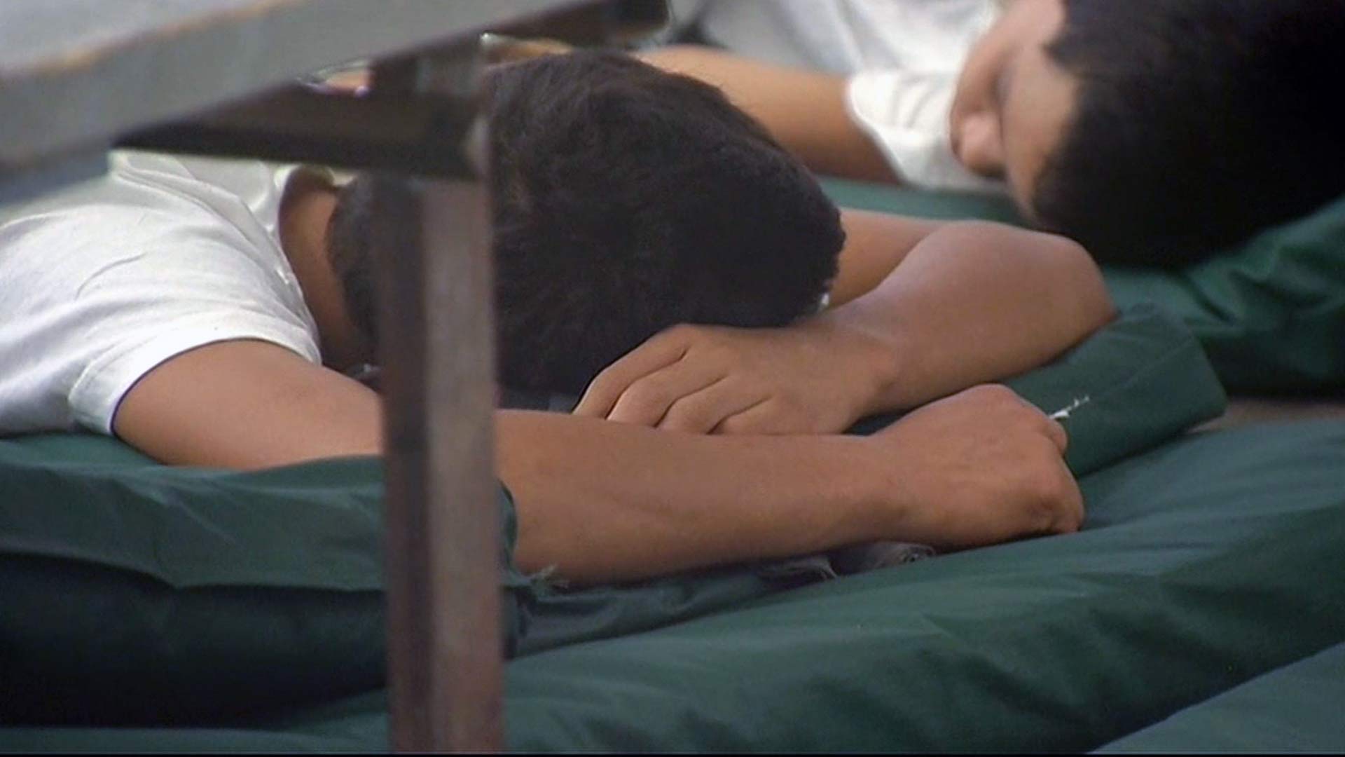 Immigrant children rest at a detention facility in Nogales, Arizona in 2014. 