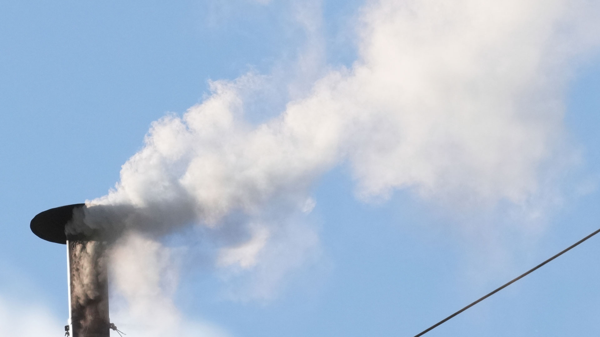White smoke billows from the chimney of the Sistine Chapel during the conclave to elect a new pope, at the Vatican, Thursday, May 8, 2025.