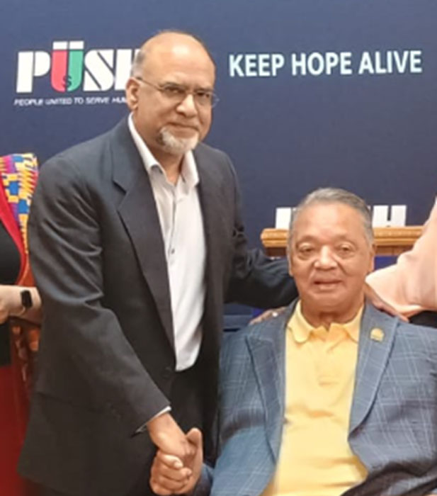 Irfan Sarwar and Jesse Jackson unsized