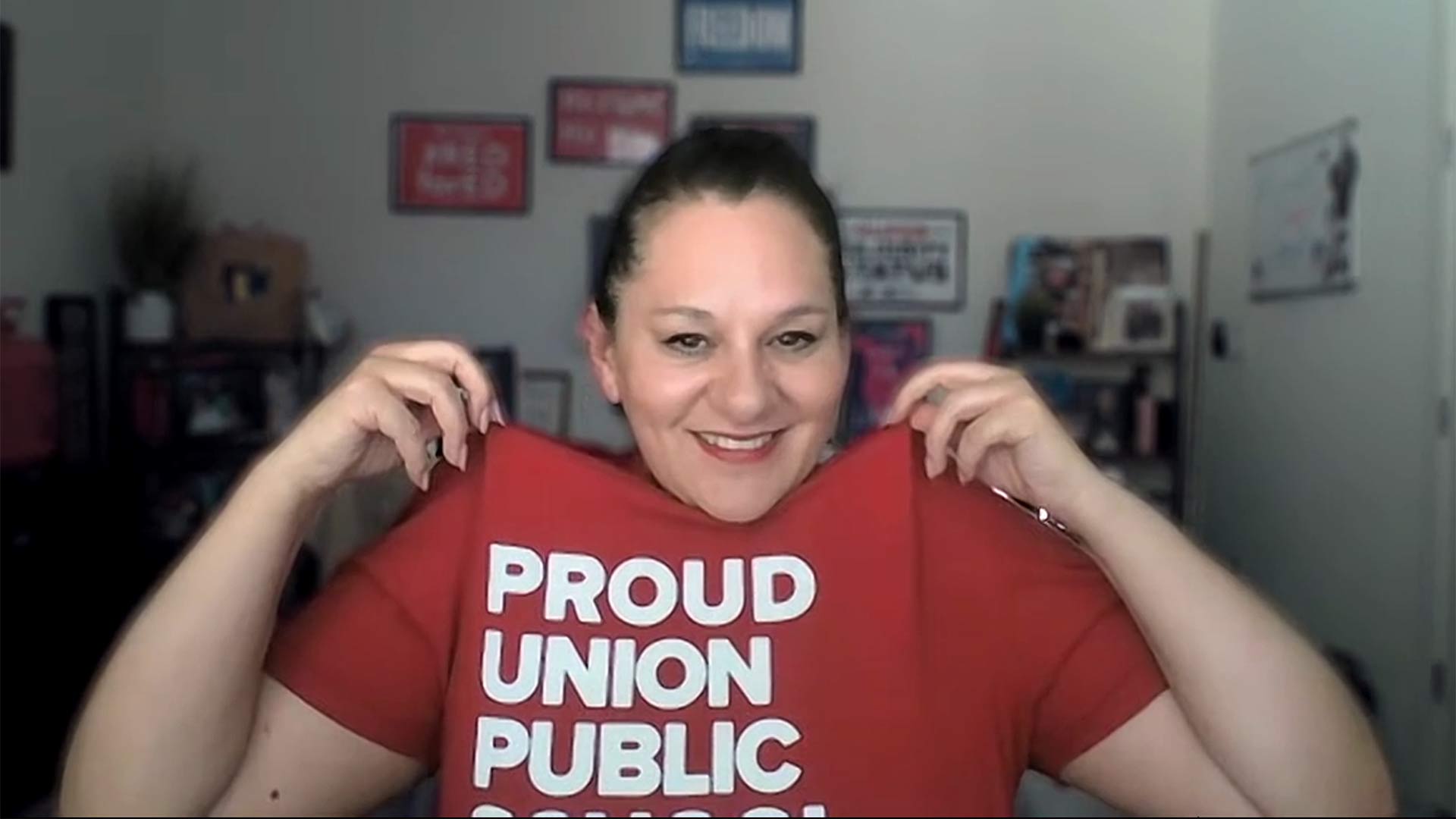 Marisol Garcia, President of the Arizona Education Association, shows her Union Strong t-shirt. Screenshot from an August, 2025 episode of The Press Room.