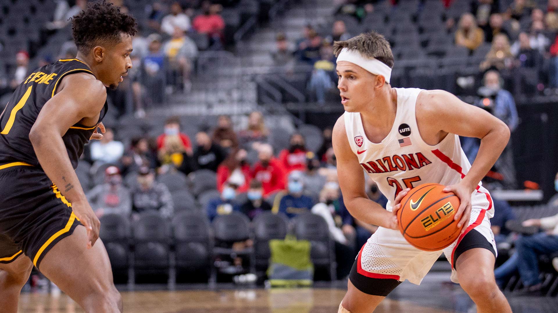 Former UA basketball player pleads not guilty to wire fraud charges
