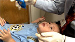 Doctor examines baby