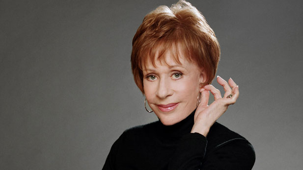 Carol Burnett, shown tugging her ear, a gesture with which she ended each broadcast of "The Carol Burnett Show." 