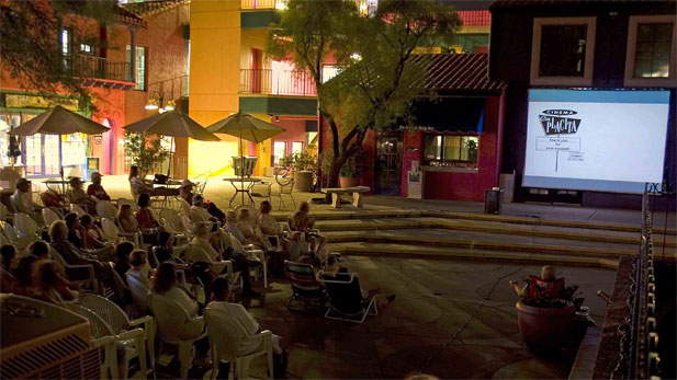 The scene at Cinema La Placita, a warm-weather, outdoor theater in open space at La Placita Village. 