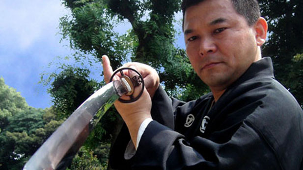 his student studies under the tutelage of grand master swordsman Fumon Tanaka