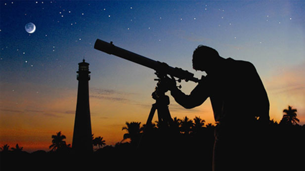 Patrick Ferris peers through telelscope